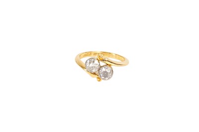Lot 20 - A Diamond Two Stone Twist Ring, the an old cut...