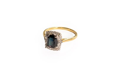 Lot 131 - An 18 Carat Gold Sapphire and Diamond Cluster...