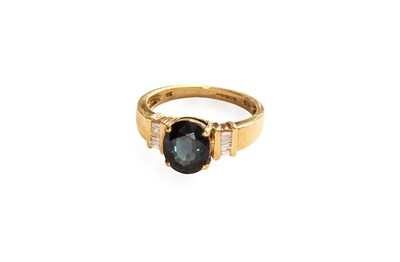Lot 56 - A 9 Carat Gold Sapphire and Diamond Ring, the...