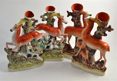 Lot 302 - Two pairs of Staffordshire stag spill vases