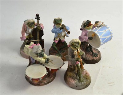 Lot 303 - Four china musicians modelled as toads in 18th century style costume