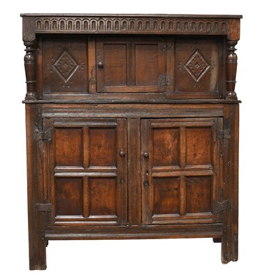 Lot 425 - An 18th Century Carved Oak Court Cupboard,...