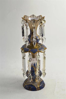 Lot 306 - A Bohemian blue and gilt decorated glass centre piece with drop lustres