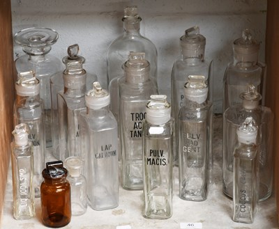 Lot 46 - A Collection of Glass Apothecary Bottles,...