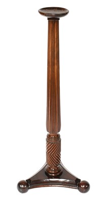 Lot 458 - A Mahogany Torchere, with reeded and fluted...