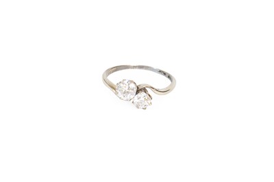 Lot 99 - A Diamond Two Stone Twist Ring, the old cut...