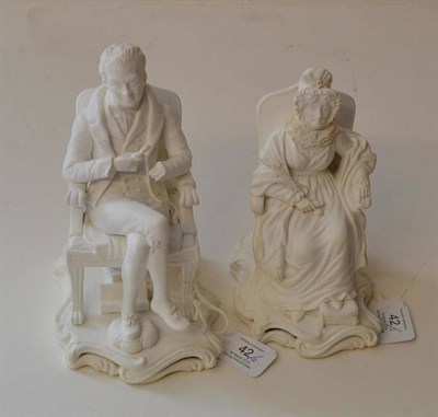Lot 42 - A Pair of Minton Bisque Porcelain Figures of William Wilberforce and Hannah Moore, each sitting...