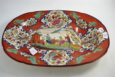 Lot 327 - A Victorian chinoiserie decorated meat plate