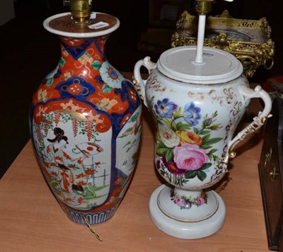 Lot 329 - A Japanese Imari vase lamp and a Continental porcelain two handled vase lamp