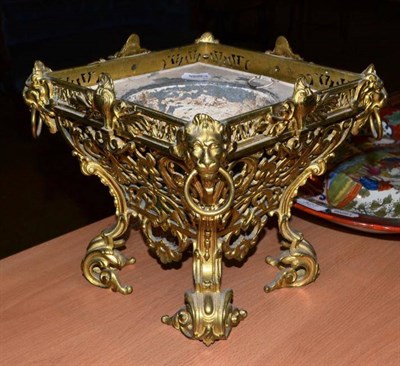 Lot 330 - An ornate cast planter with lion mask corners stamped '702' and '807'