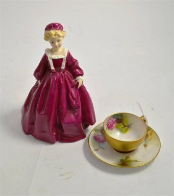 Lot 333 - Royal Worcester figure 'Grandmother's Dress' and a Royal Worcester rose painted cup and saucer