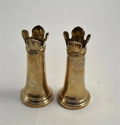 Lot 334 - A pair of loaded silver vases with cast top