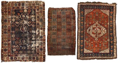 Lot 384 - South West Persian Tribal Rug, the madder...