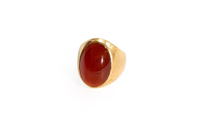 Lot 134 - A Hardstone Ring, the oval cabochon hardstone...