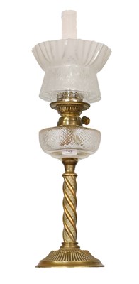 Lot 142 - A Victorian Brass Based Oil Lamp, with a cut...