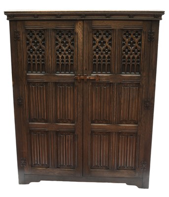 Lot 424 - A 20th Century Oak Two Door Wardrobe, the...