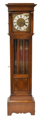Lot 405 - An Oak Quarter-Chiming Longcase Clock, mid...