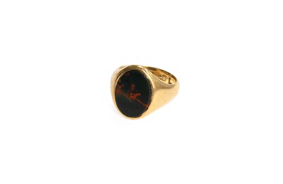 Lot 138 - A Bloodstone Signet Ring, the oval bloodstone...