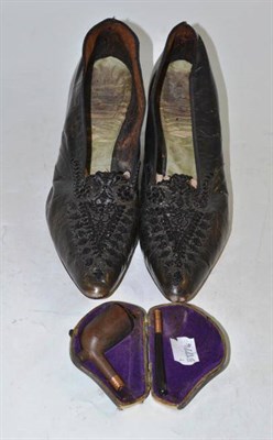 Lot 359 - A pair of black leather and beadwork shoes and a 19th century pipe, cased