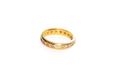 Lot 25 - A Diamond Eternity Ring, set throughout with...