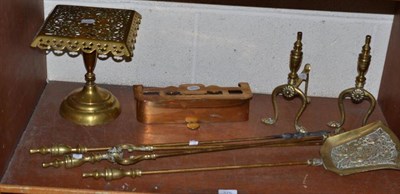 Lot 375 - Three piece brass companion set, brass trivet, pair of brass fire dogs etc