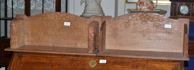 Lot 381 - Two carved oak book troughs