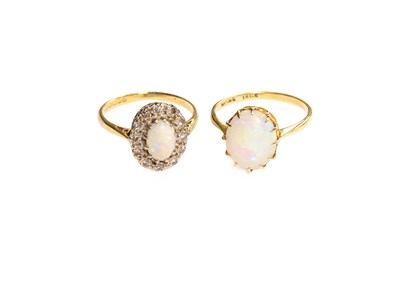 Lot 161 - An 18 Carat Gold Opal and Diamond Cluster Ring,...