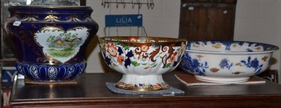 Lot 391 - An ironstone bowl, a toilet basin and a jardiniere (a.f.)