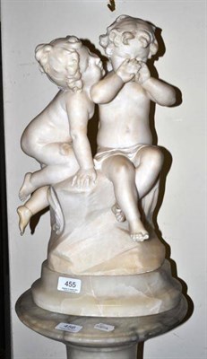 Lot 455 - 19th century alabaster group modelled as children