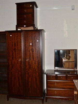 Lot 465 - Stag mahogany three piece bedroom suite comprising wardrobe, dressing table and bedside chest