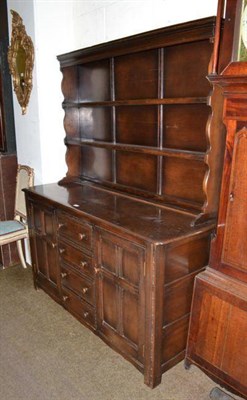 Lot 470 - An oak dresser and rack