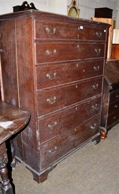 Lot 481 - A Georgian oak six height chest of drawers