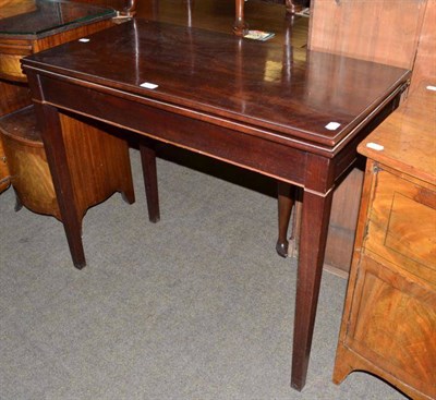 Lot 496 - Late 19th century mahogany fold-over tea table