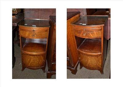 Lot 497 - A pair of reproduction mahogany bedside cupboards with brushing slide