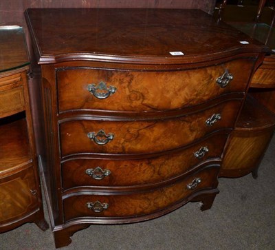 Lot 498 - Reproduction walnut serpentine front four height chest