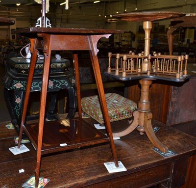 Lot 499 - A reproduction walnut tripod table with revolving under tier, a footstool and an Edwardian...