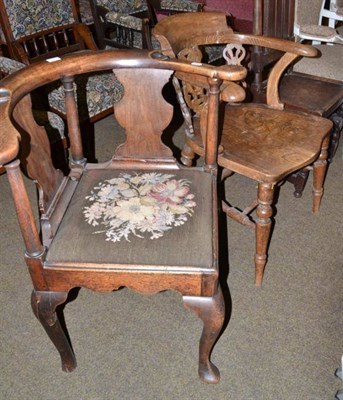 Lot 524 - A Georgian mahogany corner elbow chair and an elm captain's chair