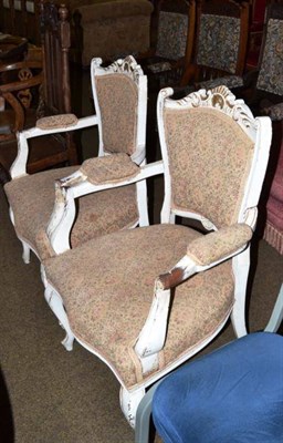 Lot 525 - An oak hall chair and a pair of white painted upholstered elbow chairs