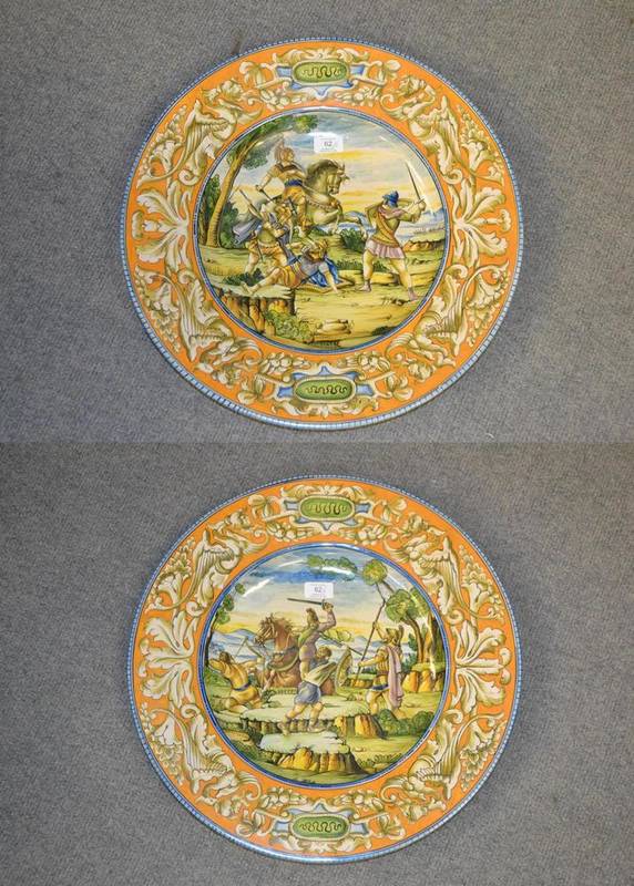 Lot 62 - A Pair of Italian Maiolica Chargers, in 16th century style, painted with titled battle scenes...