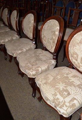 Lot 527 - A set of six Victorian mahogany balloon back dining chairs