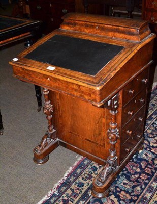 Lot 542 - A Victorian walnut Davenport