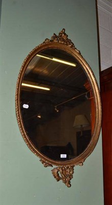 Lot 573 - 19th century oval gilt mirror