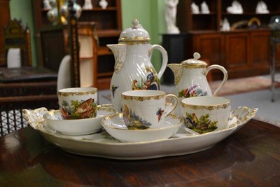 Lot 70 - A Berlin Porcelain Cabaret Set, 19th century, painted with exotic and domestic birds in...