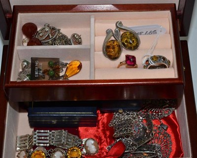 Lot 5 - A jewellery box containing assorted silver and white metal jewellery, amber set pieces,...