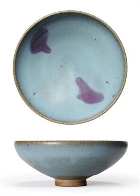Lot 80 - A Yuan Style Junyao Stoneware Bowl, of shallow form, splashed with two purple patches on a blue...