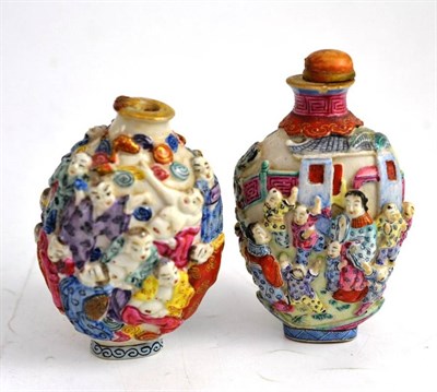 Lot 28 - Two polychrome decorated snuff bottles