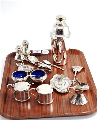 Lot 43 - A collection of small silver including a pair of mustards, two bun pepperettes, pair of salts,...