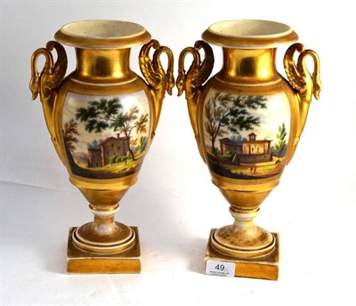 Lot 49 - A pair of Continental porcelain vases, each painted with a landscape and an interior scene (2)
