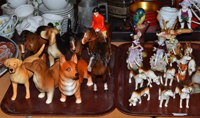 Lot 57 - A Beswick mounted huntsman, eight hounds, a Continental porcelain vase modelled as a tree...