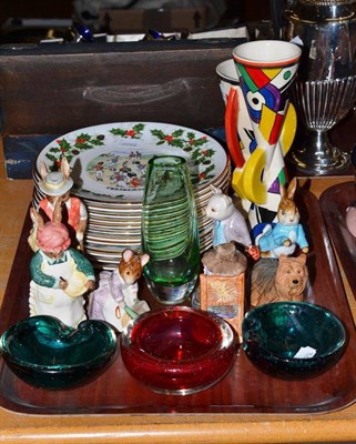 Lot 67 - Six assorted Beatrix Potter figures and a dog, Royal Grafton Christmas plates, coloured glass etc